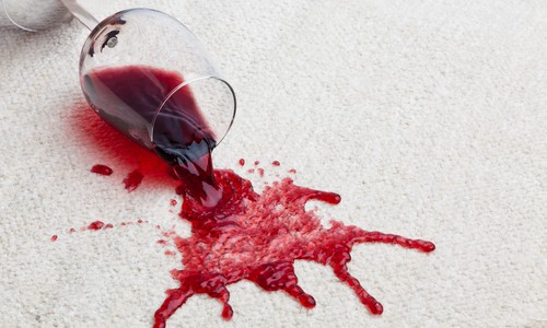 Red wine stain on carpet